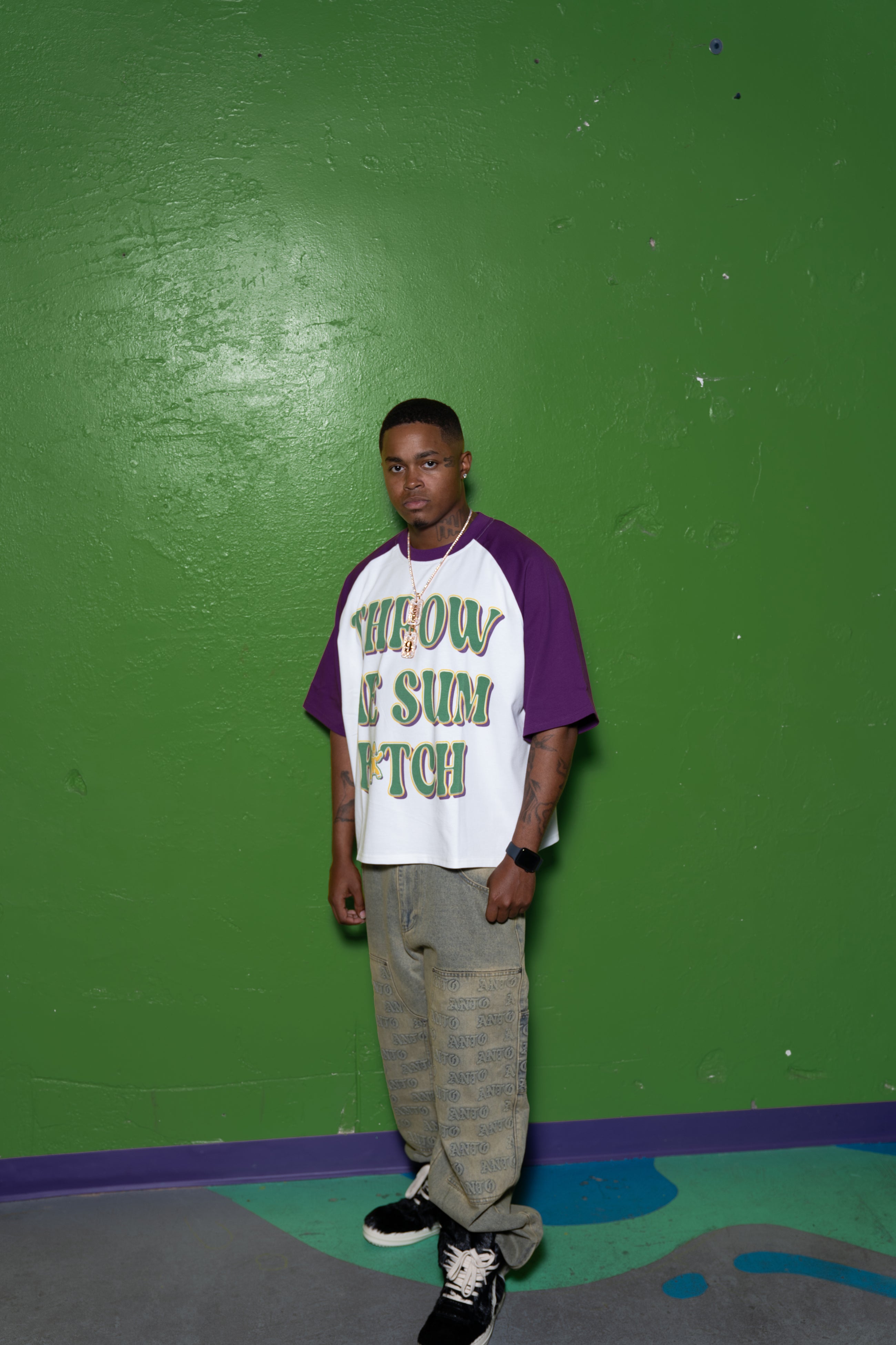 MG RAGLAN S/S TEE PURPLE 'THROW ME SUM B*TCH'