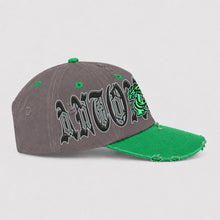Front view of ANTOXTMS tan and brown distressed cap with yellow dragon graphic